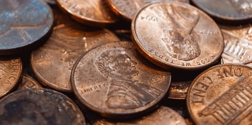 Several pennies laying out