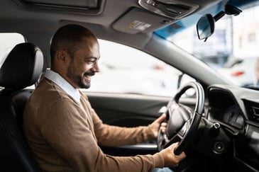 man-driving-vehicle