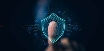 A thumbprint touches a screen and a blue, digital shield appears