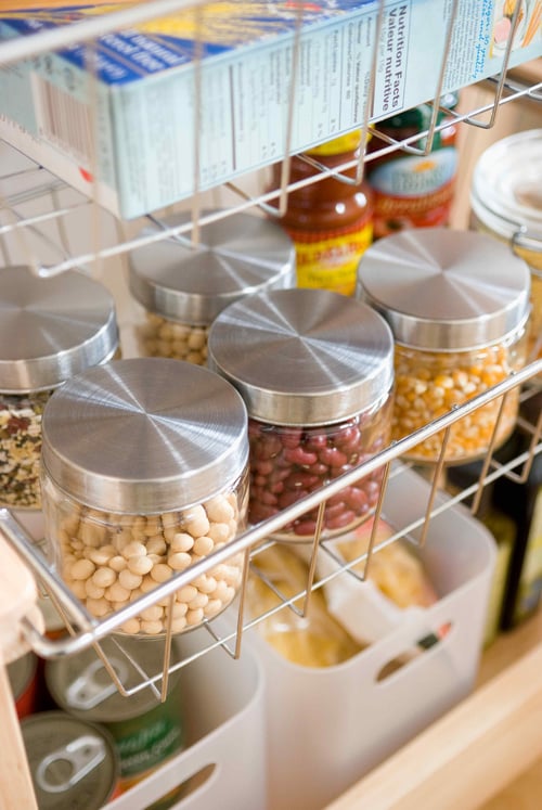 Closeup of food storage racks in a pantry