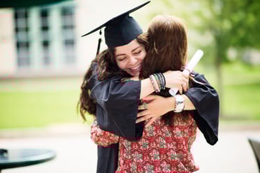 graduate-hugging-their-parent-after-graduation