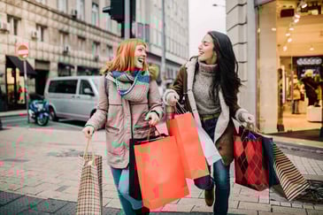 two-women-in-the-street-shopping
