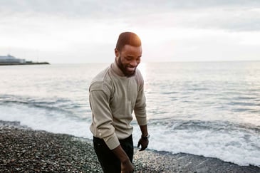 man-walking-on-the-beach