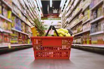 basket-of-food-in-grocery-aisle