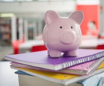 pinny-bank-on-top-of-school-books