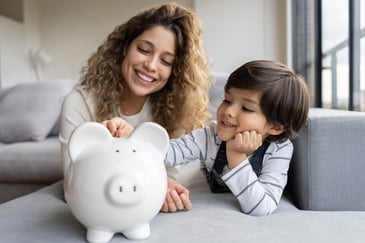mother-teaching-her-child-about-money-with-piggyback