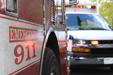 Close-up of emergency vehicles arrived at a scene.